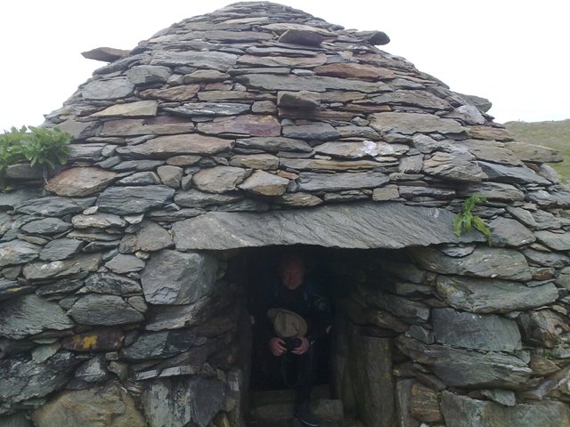 Diver exits a beehive hut on High Island